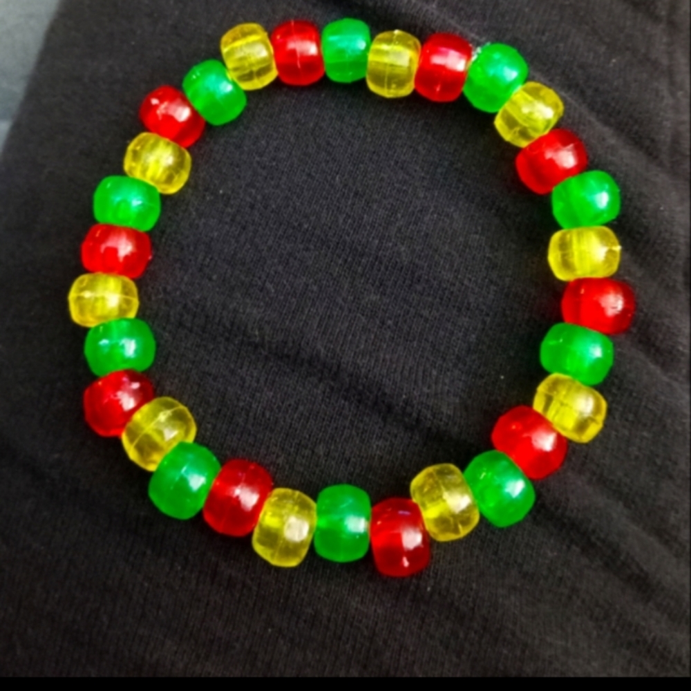 Hand Crafted rastafari red yellow and green stretchy beaded bracelet